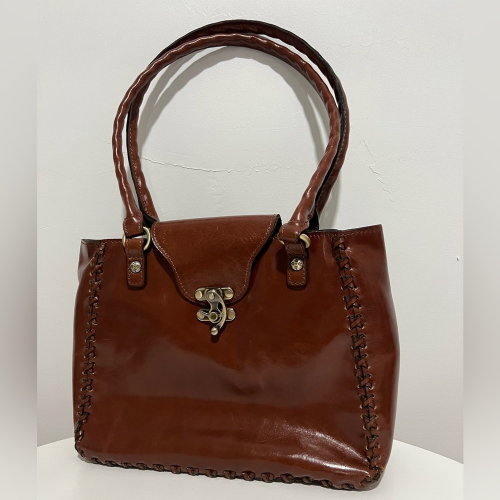 Patricia Nash leather shoulder bag. Excellent condition with tags.